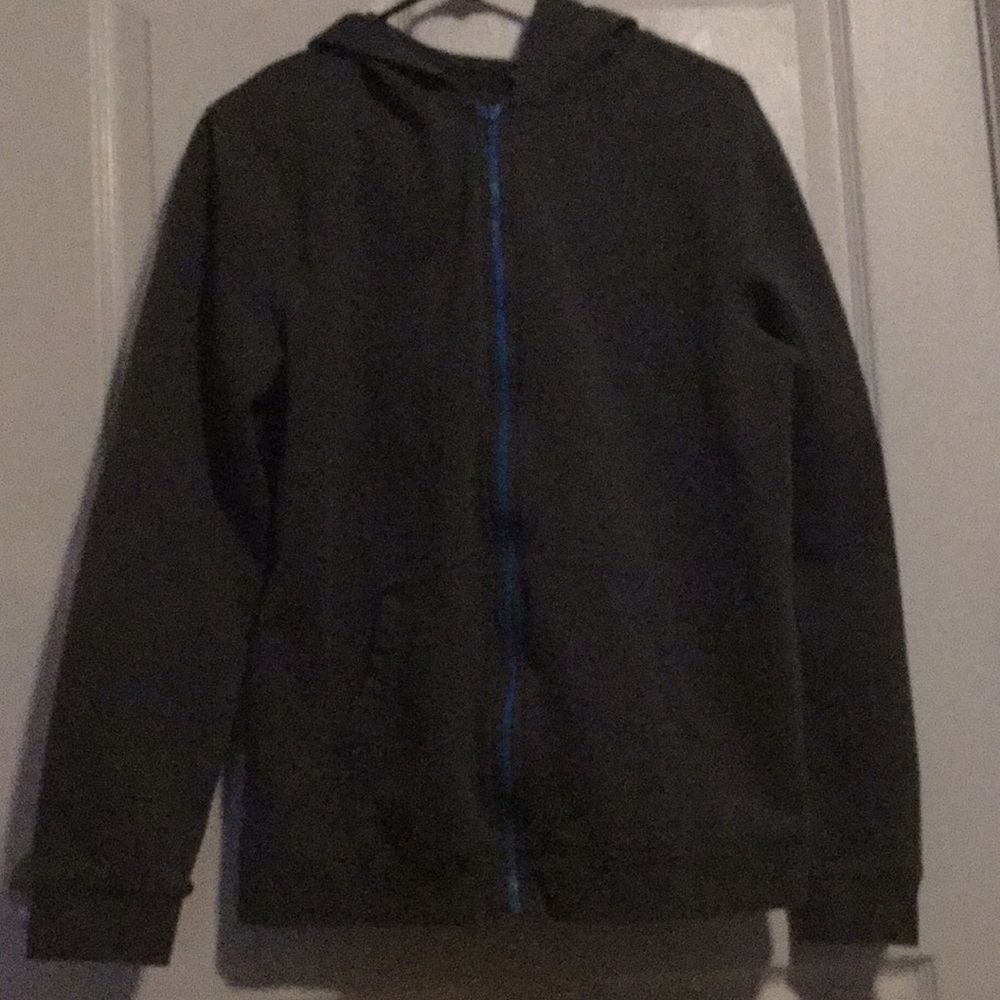 Gray jacket with blue zipper